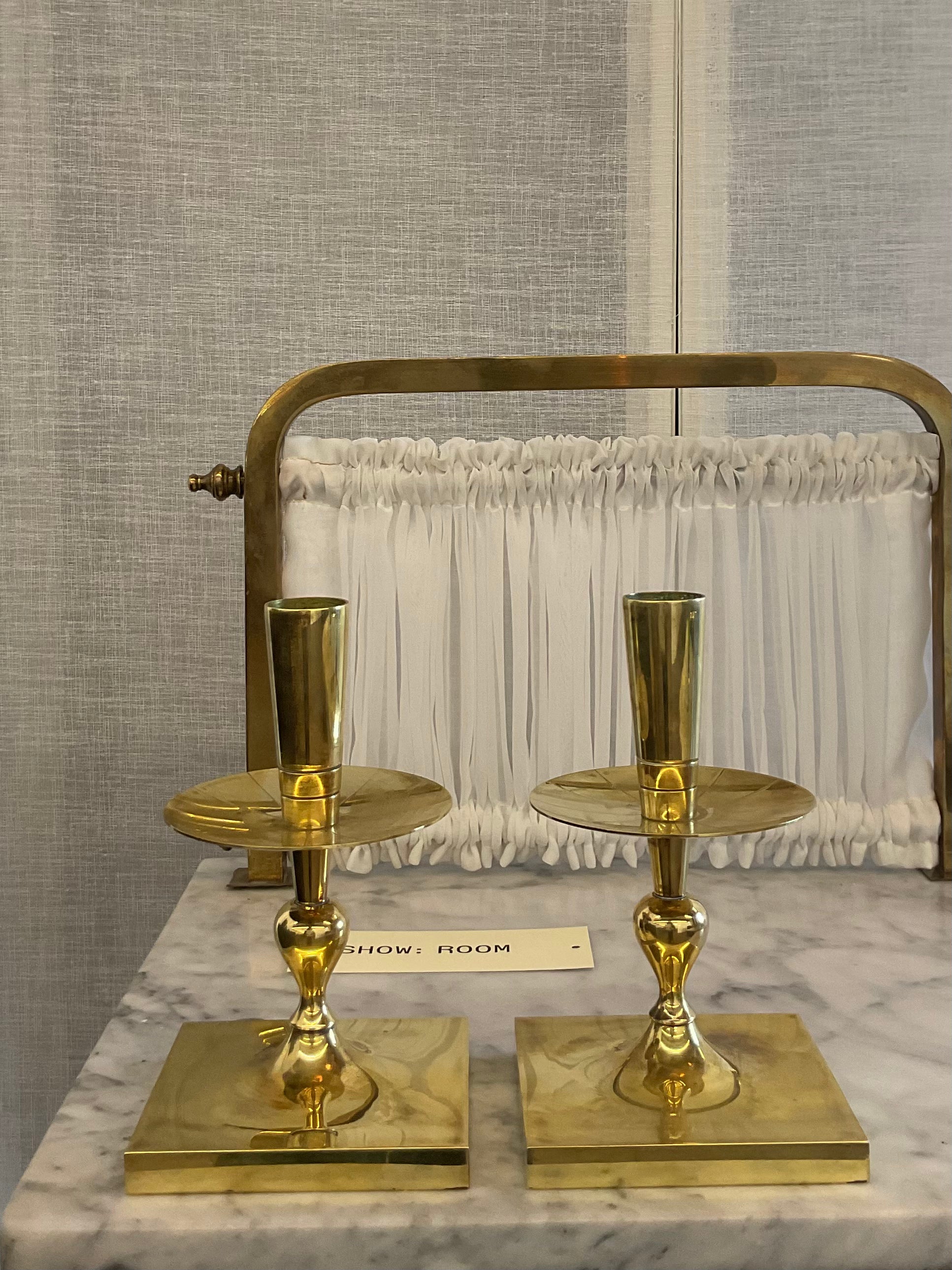 Pair of Brass Candlesticks by Tommi Parzinger